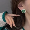 French retro green H-letter stud earrings with a light luxury and niche design, exuding a sense of sophistication and elegance. 925 silver needle earrings for women Specification image